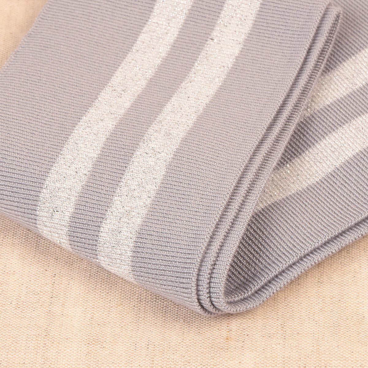Light grey metallic cuff and waistband trim