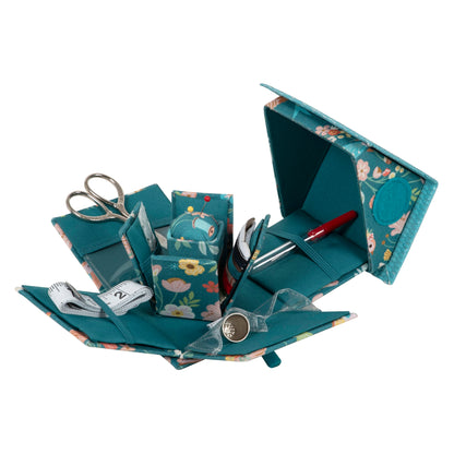 Fabric-covered Victorian house sewing case with bird aviary applique