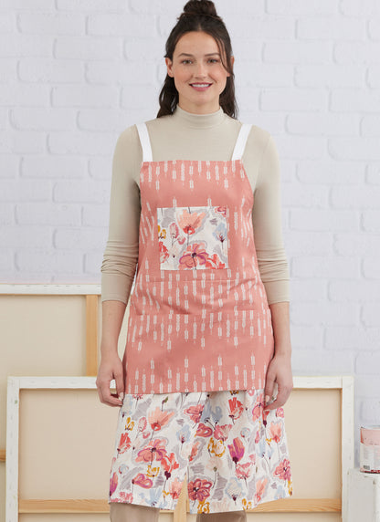 Simplicity S3021 sewing pattern envelope showing aprons designs