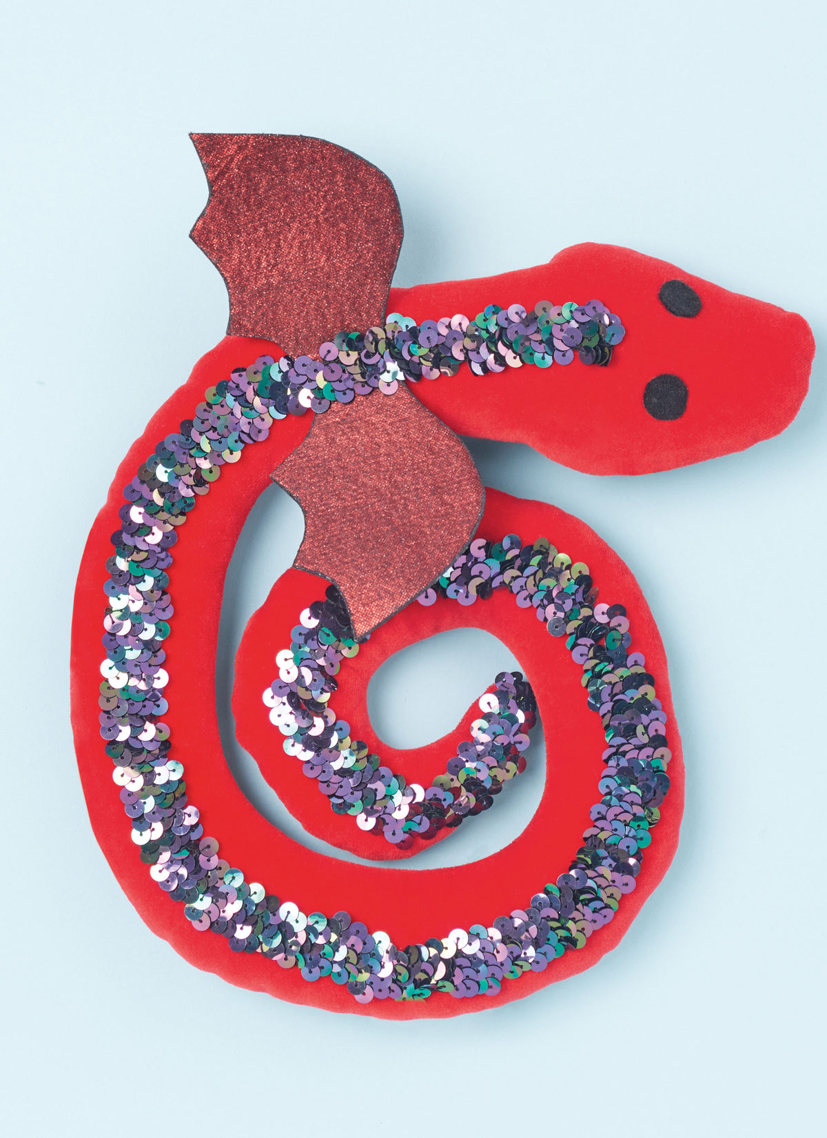 Simplicity S3022 sewing pattern envelope showing stuffed snake, axolotl & dragon toys designs