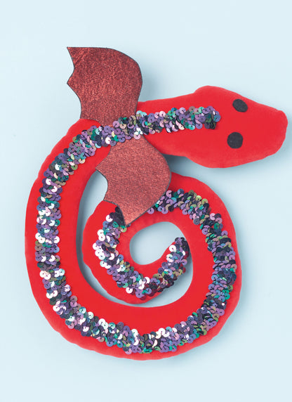 Simplicity S3022 sewing pattern envelope showing stuffed snake, axolotl & dragon toys designs