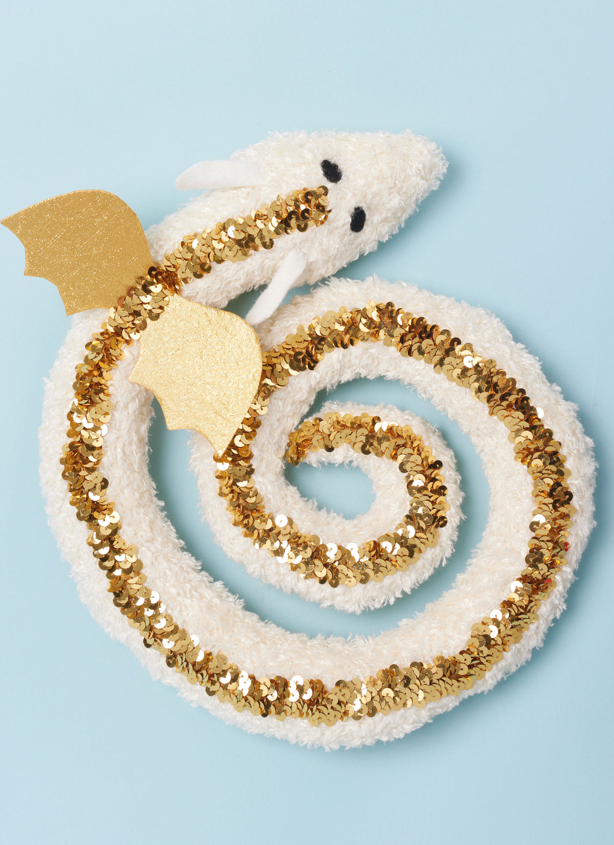 Simplicity S3022 sewing pattern envelope showing stuffed snake, axolotl & dragon toys designs