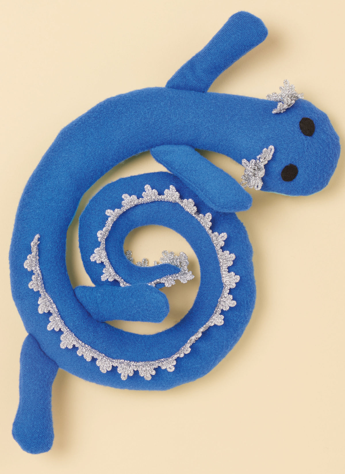 Simplicity S3022 sewing pattern envelope showing stuffed snake, axolotl & dragon toys designs
