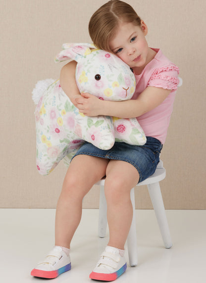 Simplicity S3023 sewing pattern envelope showing stuffed toys designs