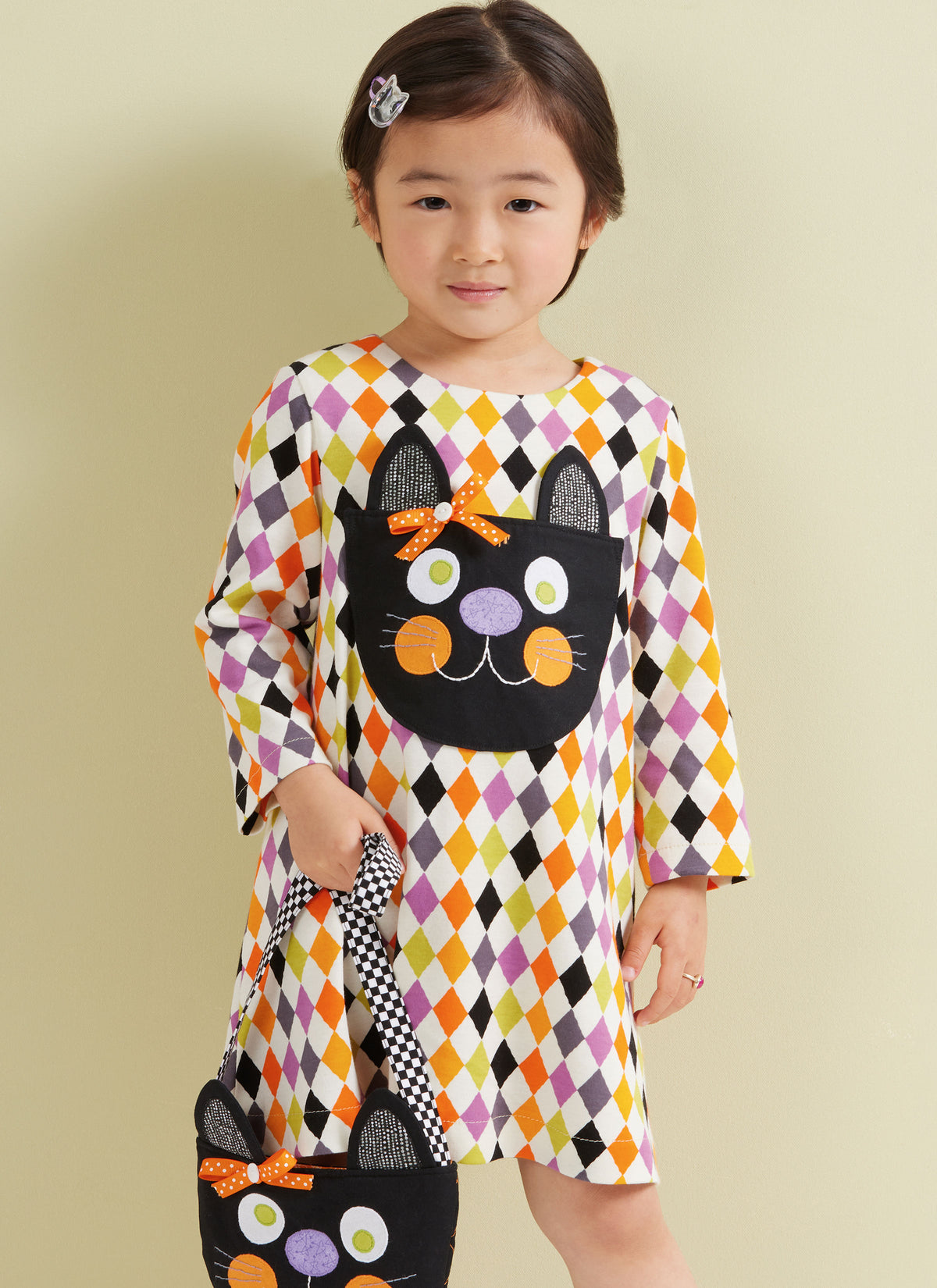 Simplicity S3042 sewing pattern envelope showing toddler dress designs
