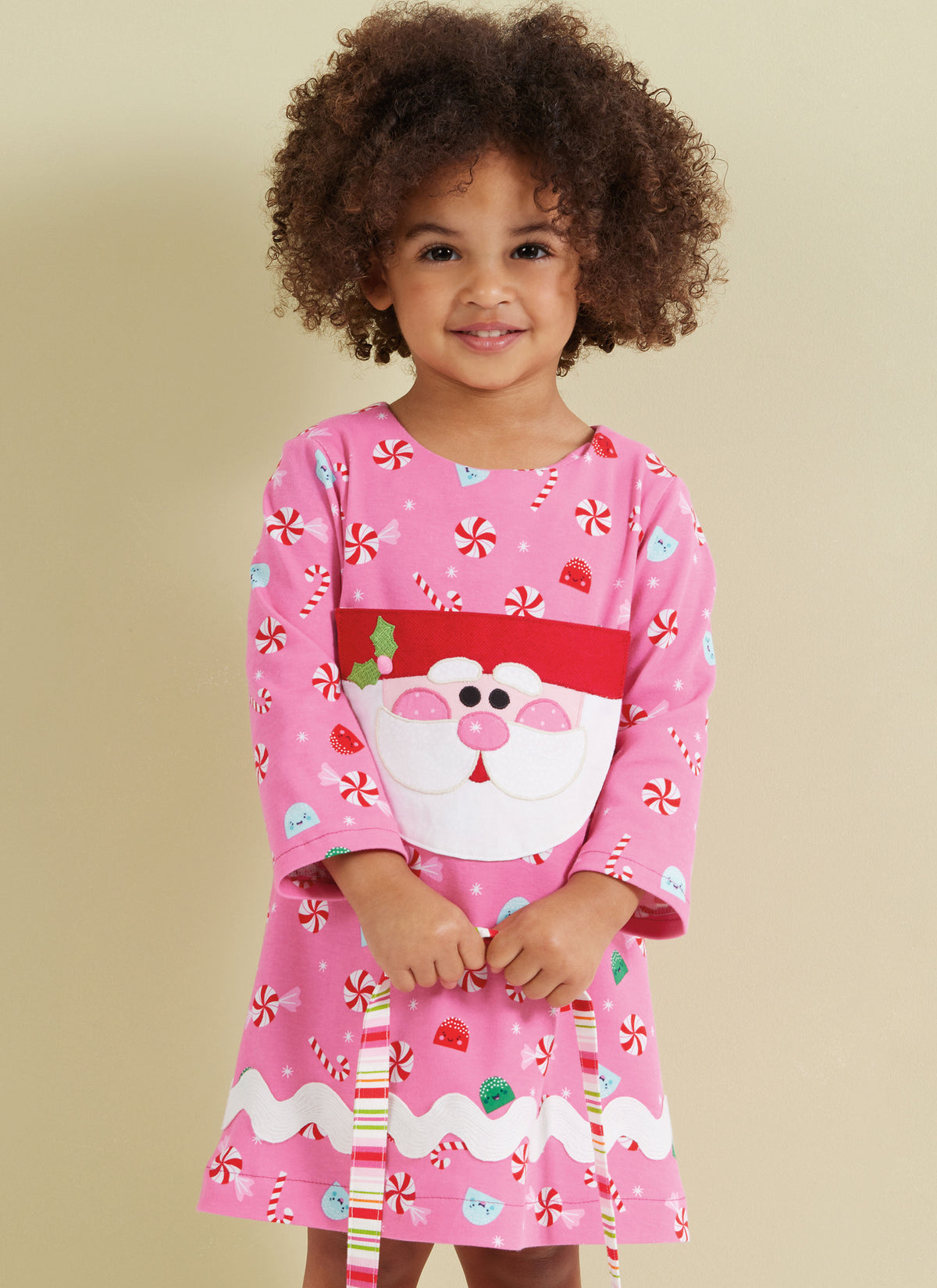 Simplicity S3042 sewing pattern envelope showing toddler dress designs