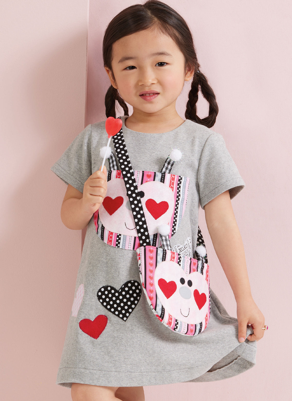 Simplicity S3042 sewing pattern envelope showing toddler dress designs