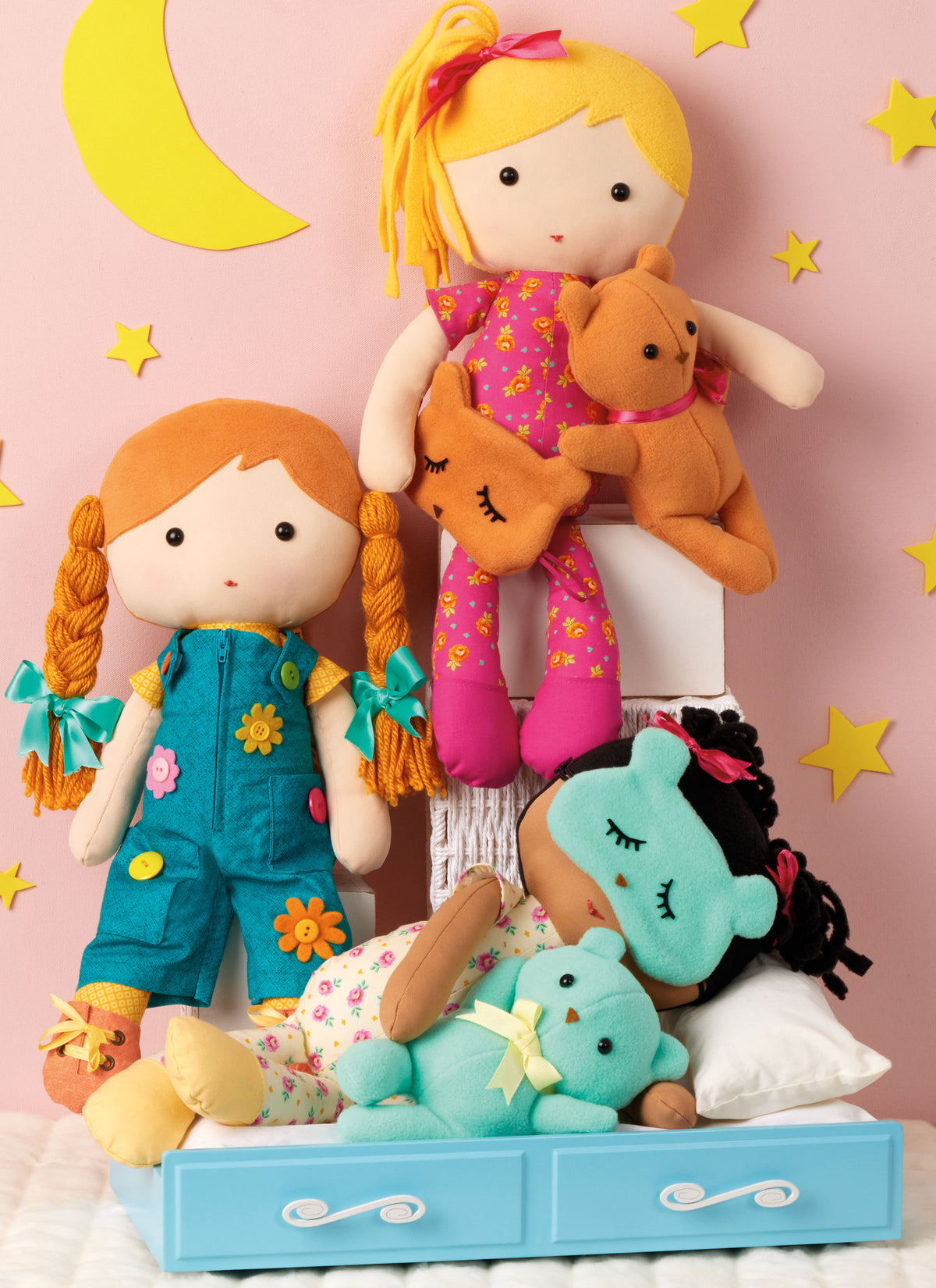 Simplicity S3053 sewing pattern envelope showing stuffed dolls with a choice of hair styles