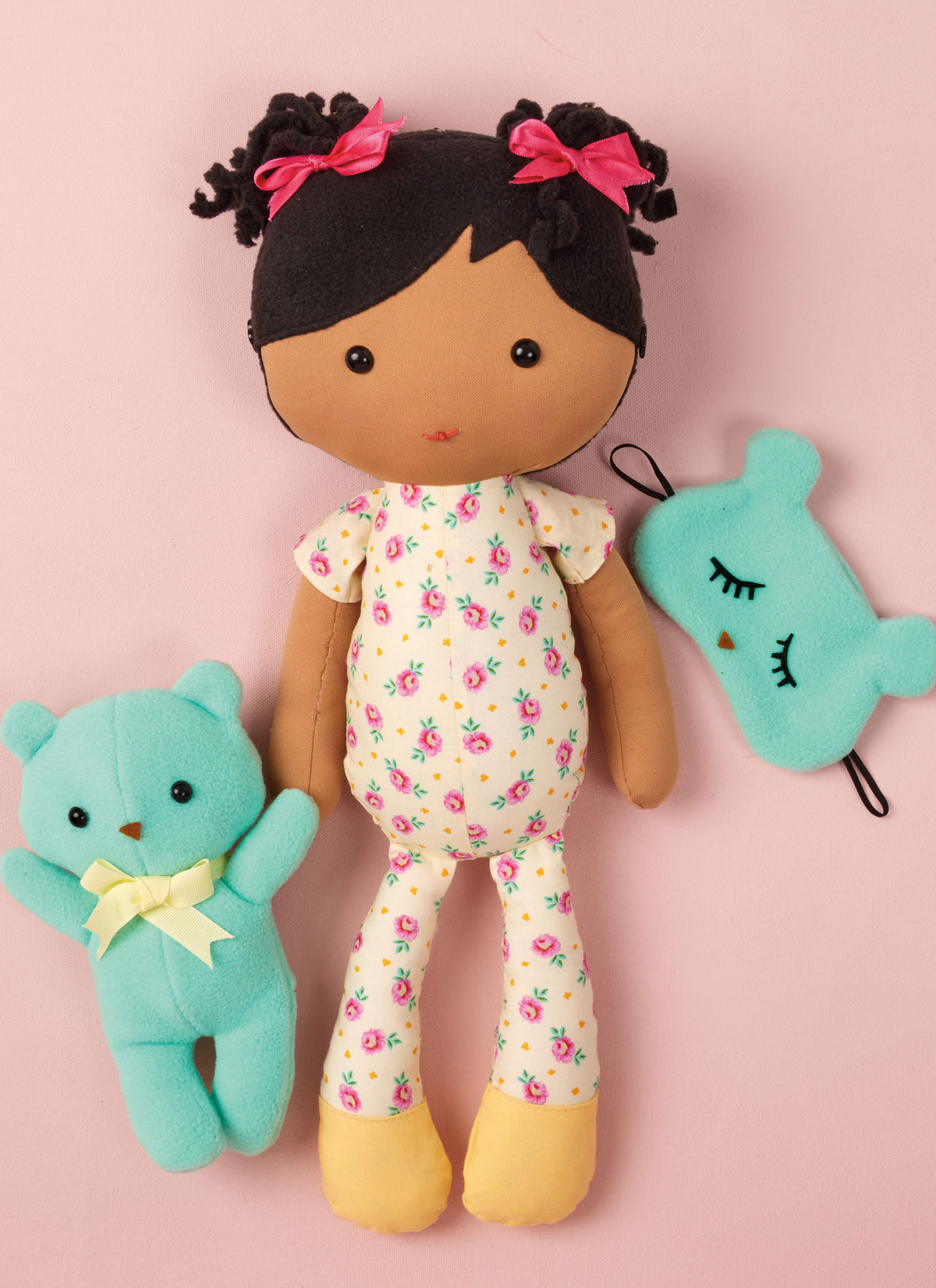 Simplicity S3053 sewing pattern envelope showing stuffed dolls with a choice of hair styles