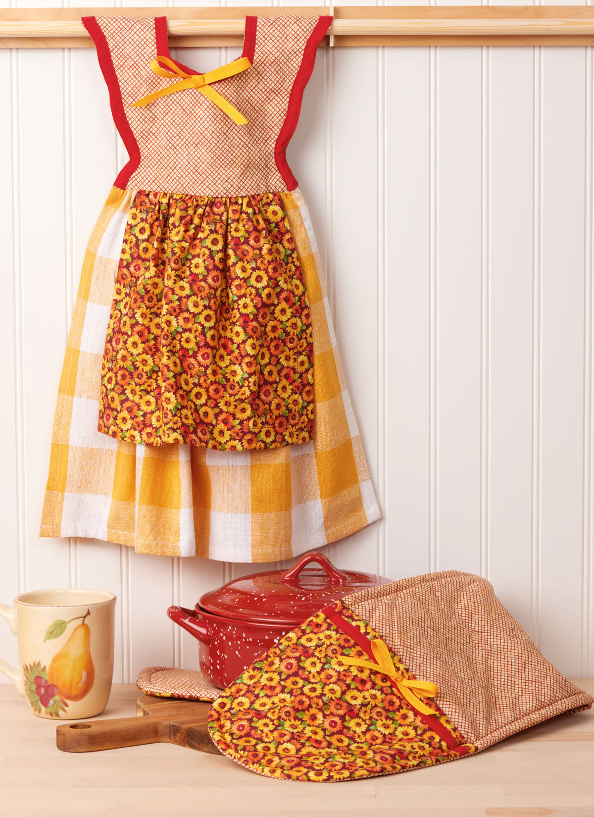 Simplicity S3057 sewing pattern envelope showing dress-style covers for shop-bought dish towels