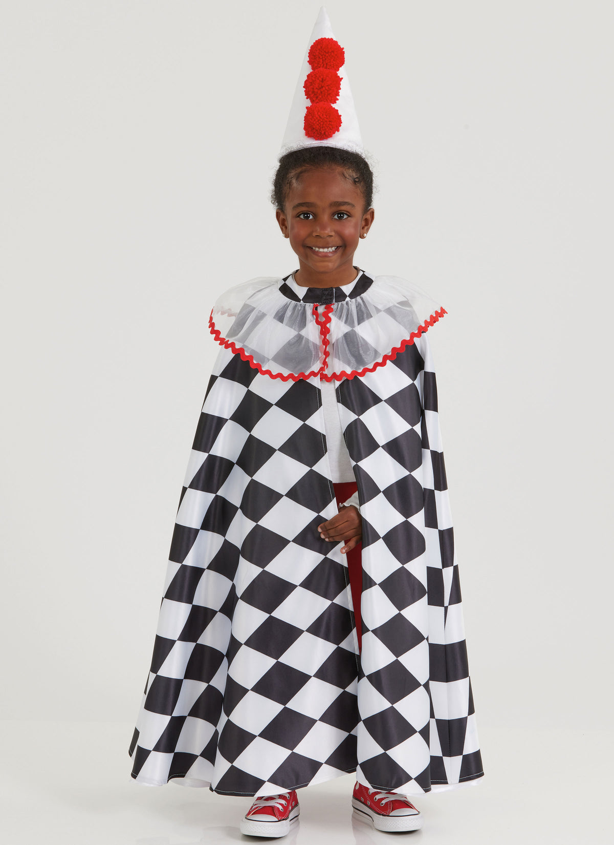 Simplicity S3061 sewing pattern envelope showing children's costumes with ruffle options