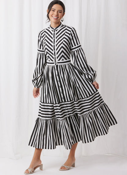 Simplicity S3098 sewing pattern envelope showing a dress with a gathered skirt
