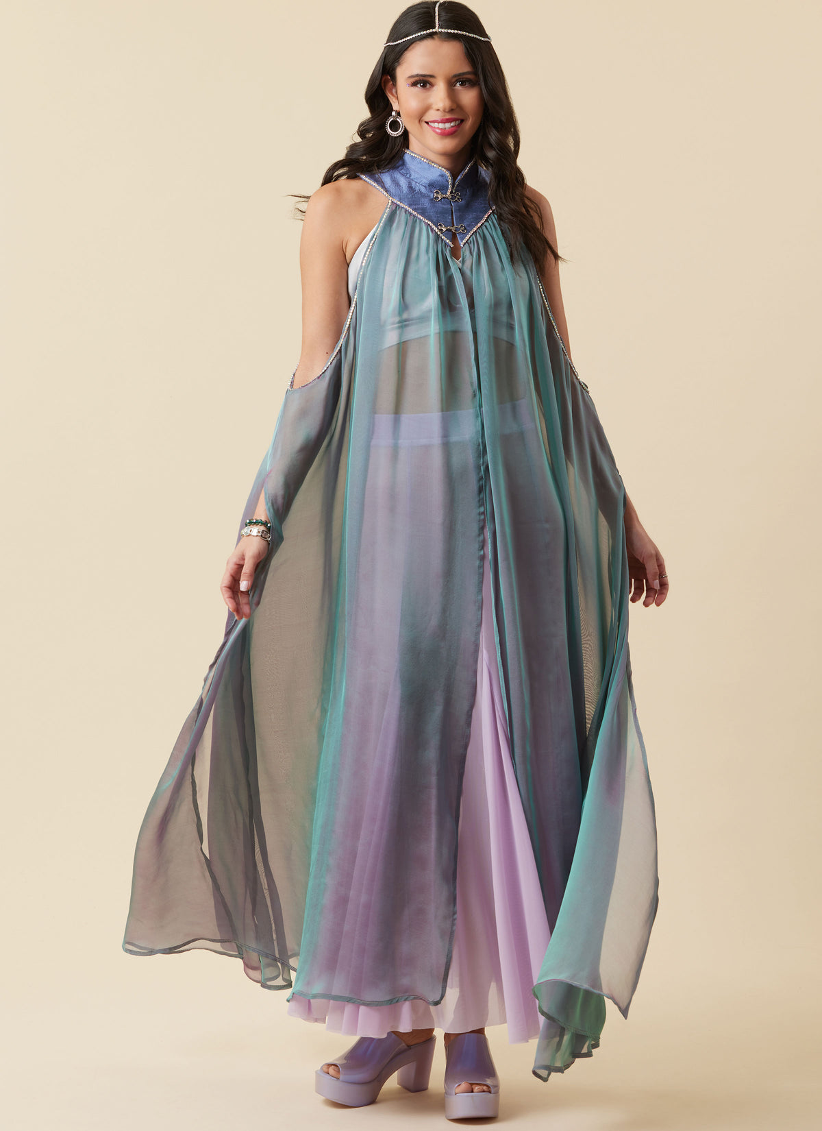 Simplicity S3161 pattern envelope showing sheer flowing capes in four styles