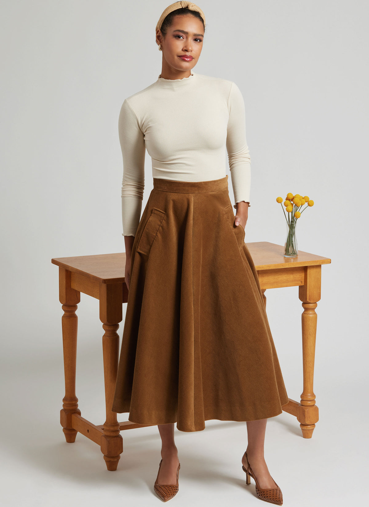 Simplicity S3169 pattern envelope showing a skirt and trousers