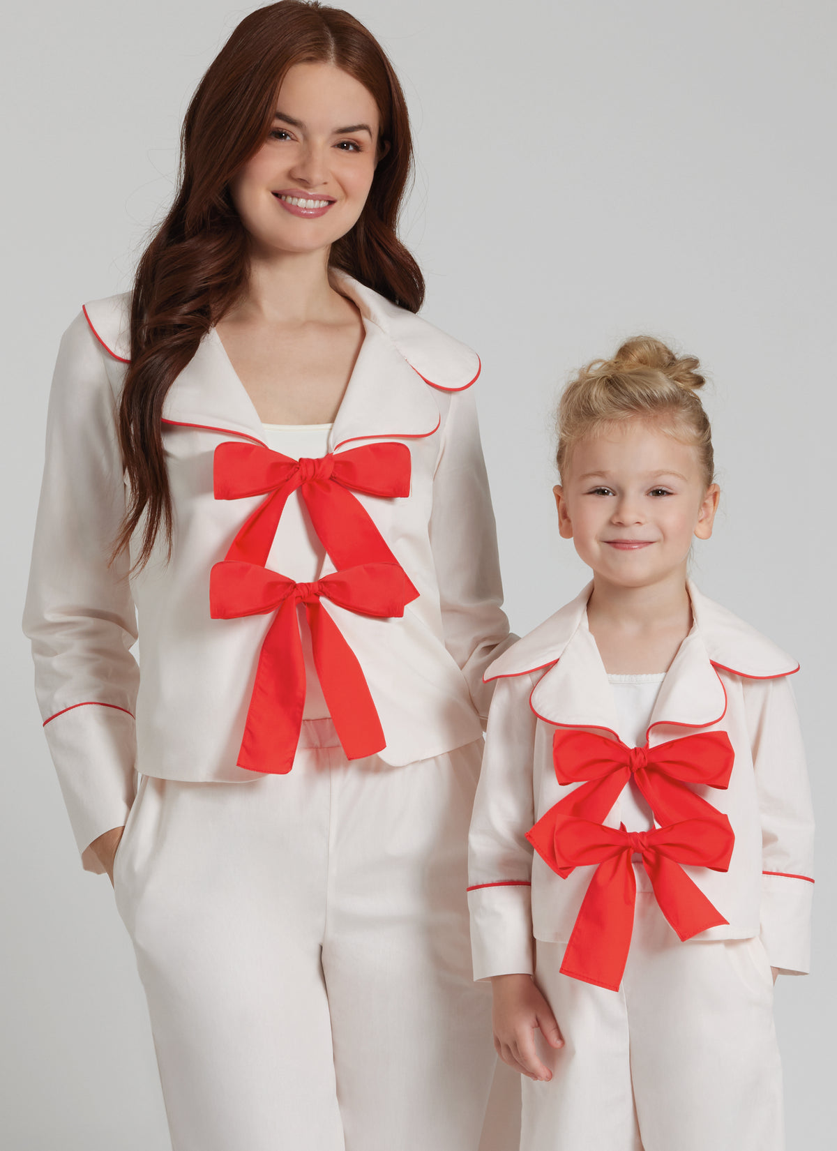 Simplicity S3202 pattern envelope showing children's pyjamas with piped lapels