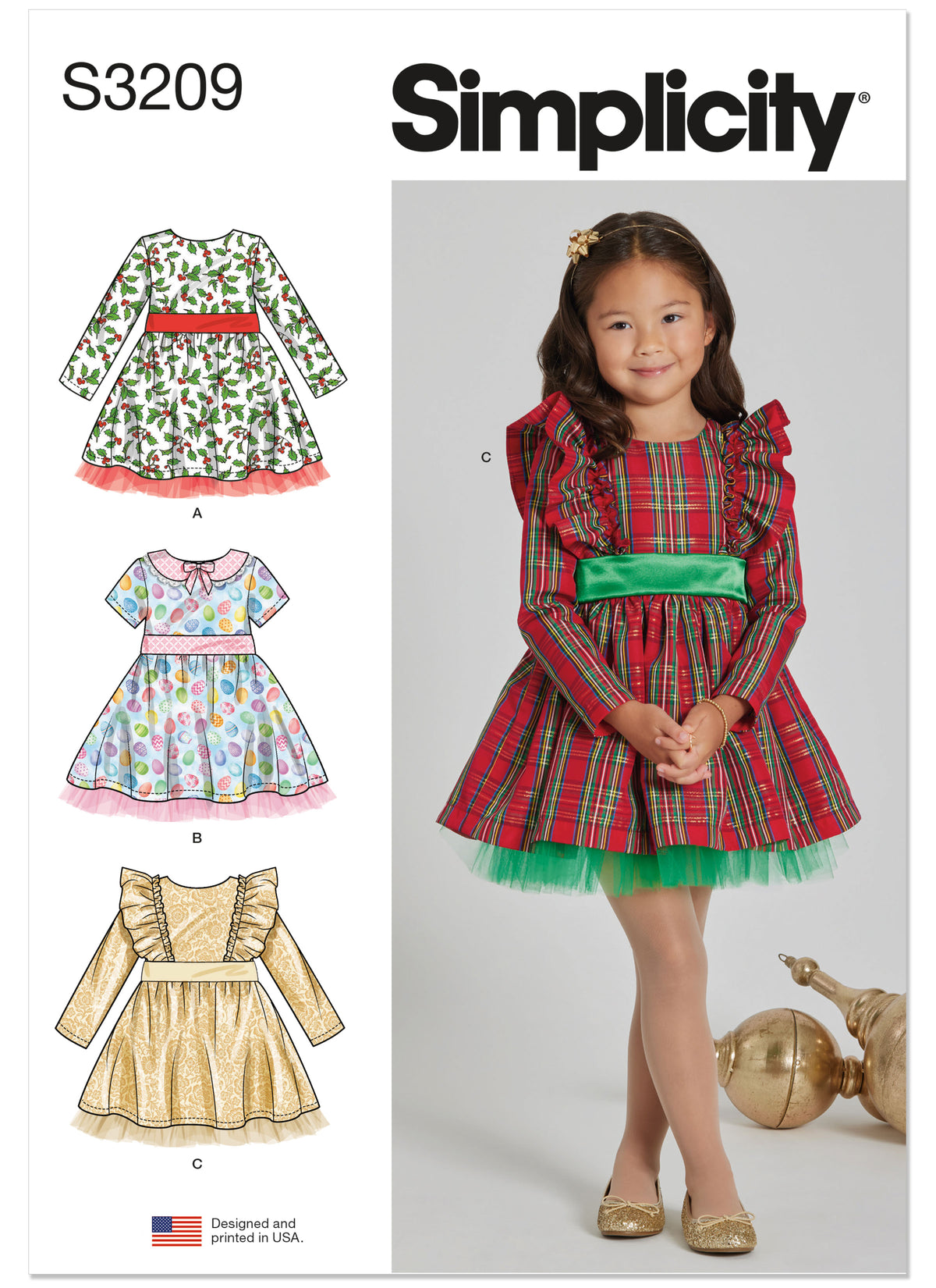 Simplicity S3209 pattern envelope showing children's holiday dresses