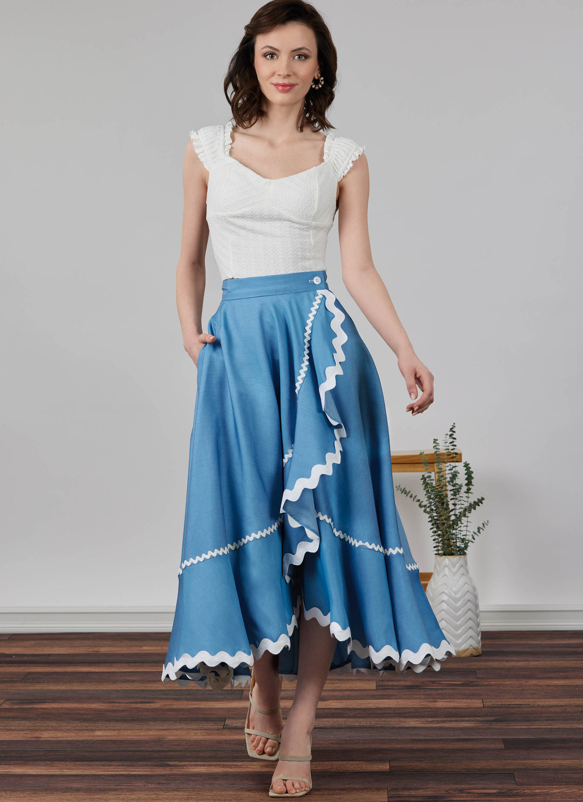 Simplicity S3235 sewing pattern envelope showing a skirt or trousers