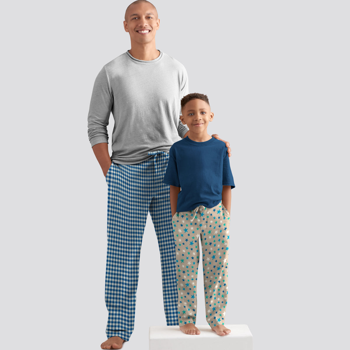 Simplicity S8519 sewing pattern envelope showing men's and boys' lounge trousers