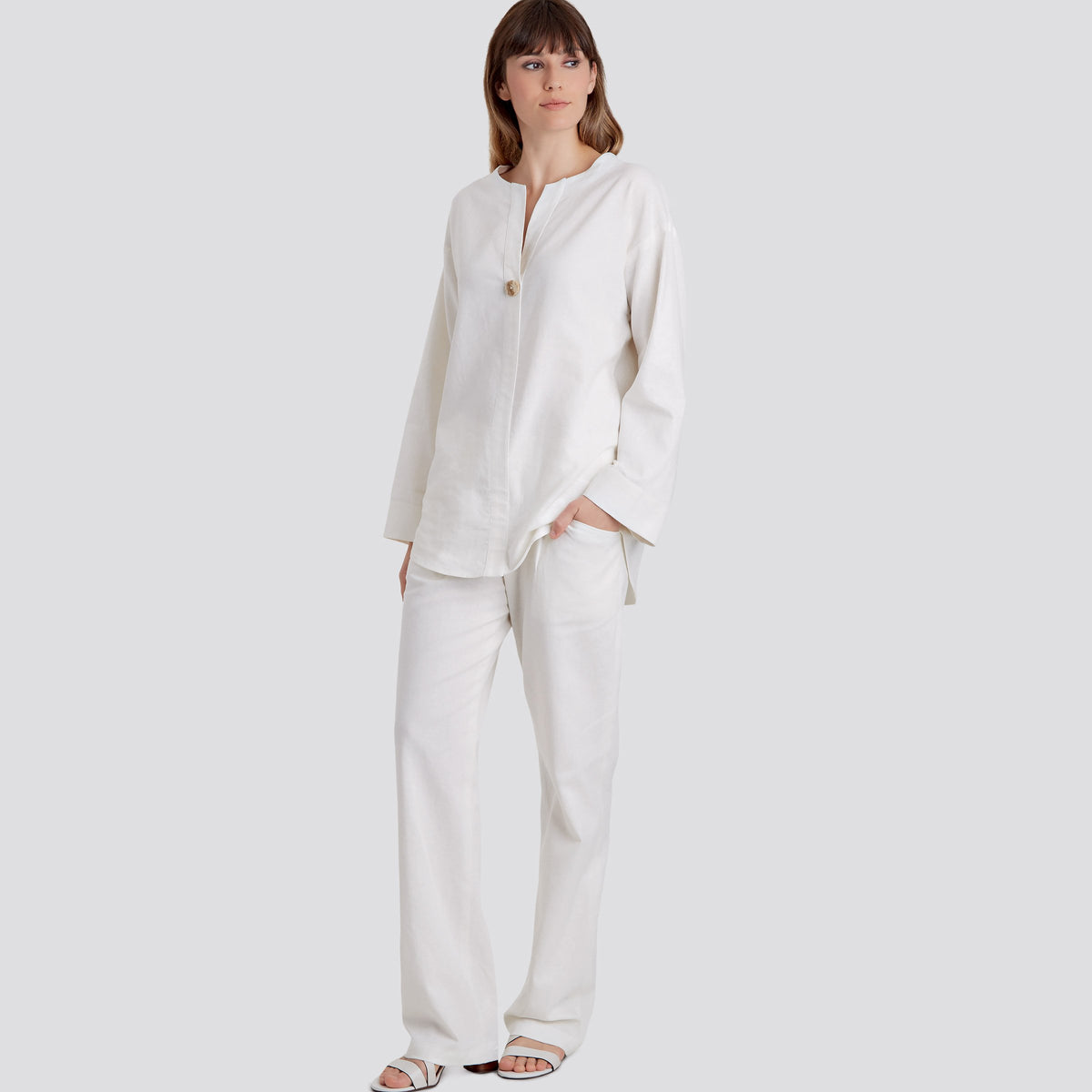 Simplicity S9113 sewing pattern envelope showing the Misses' Button Front Tunic and Tops designs