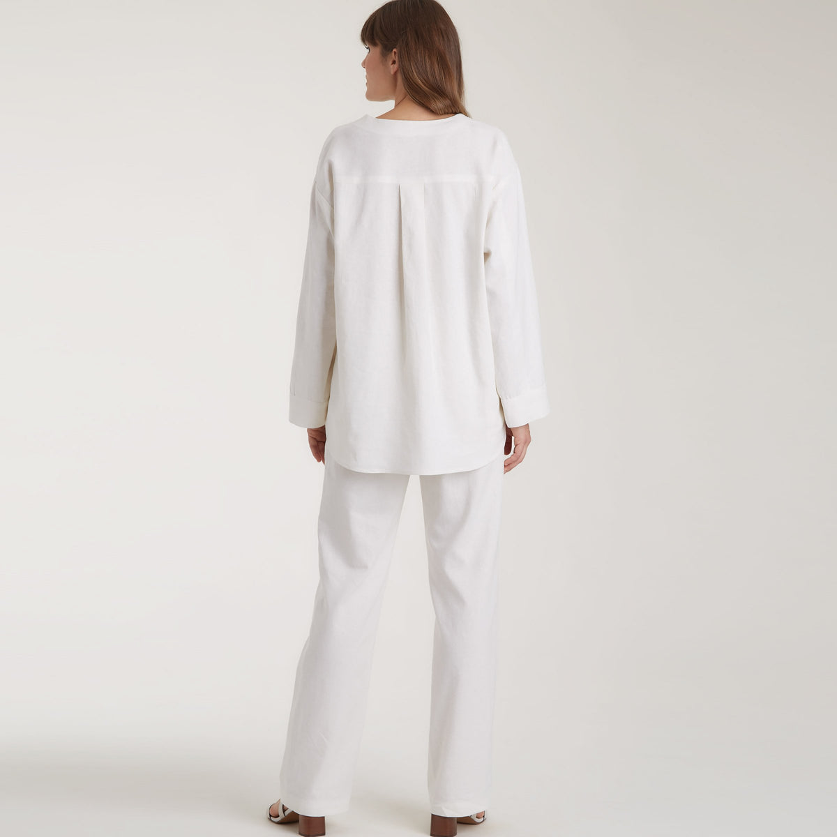 Simplicity S9113 sewing pattern envelope showing the Misses' Button Front Tunic and Tops designs