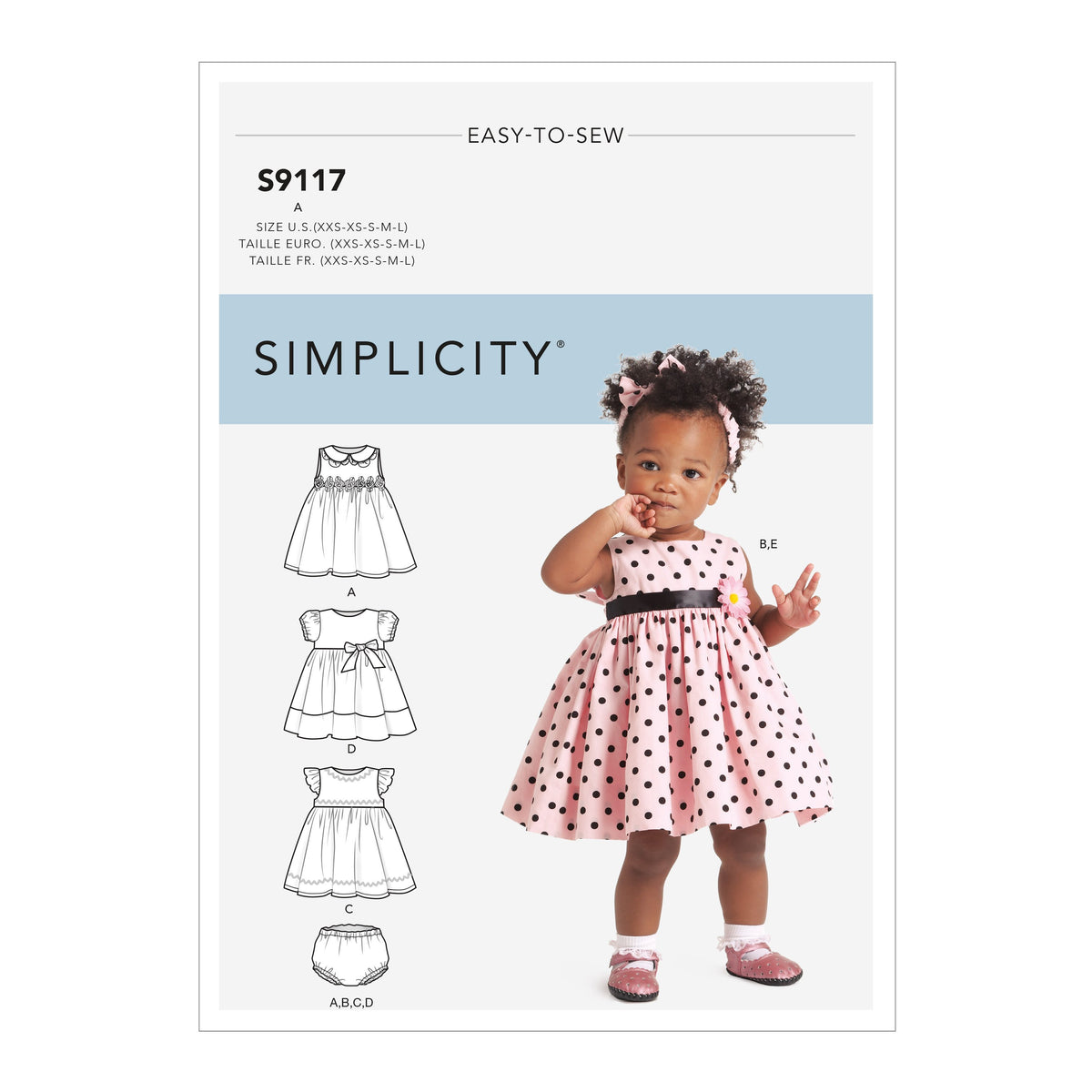 Simplicity S9117 pattern envelope showing baby dresses