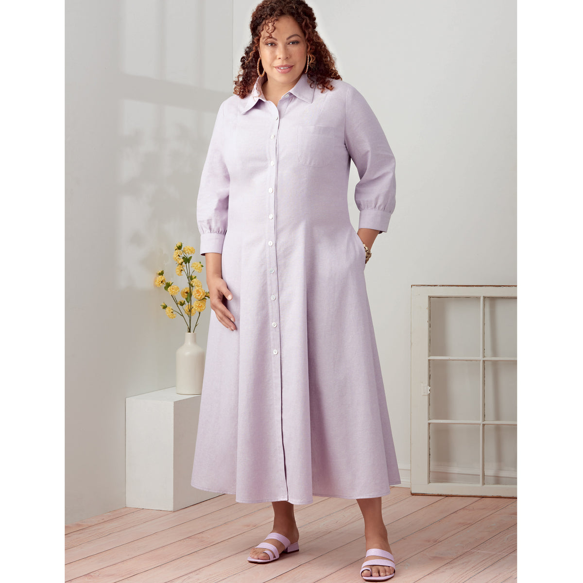 Simplicity sewing pattern S9260 envelope showing a button front dress
