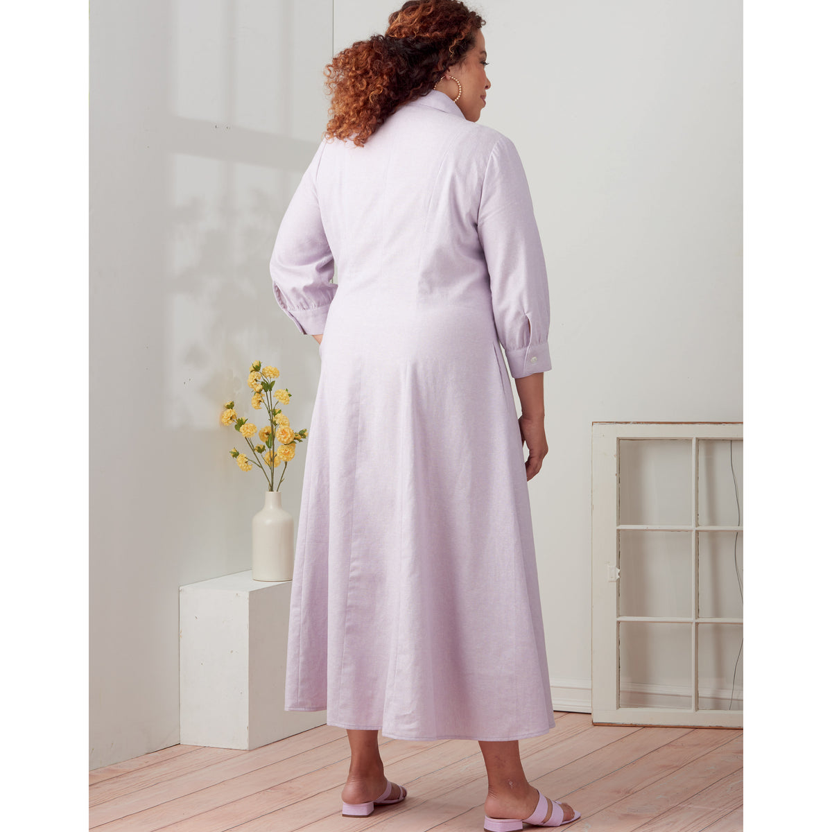 Simplicity sewing pattern S9260 envelope showing a button front dress
