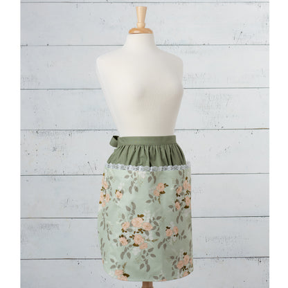 Simplicity S9301 sewing pattern envelope showing family aprons designs