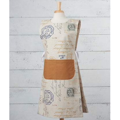 Simplicity S9301 sewing pattern envelope showing family aprons designs
