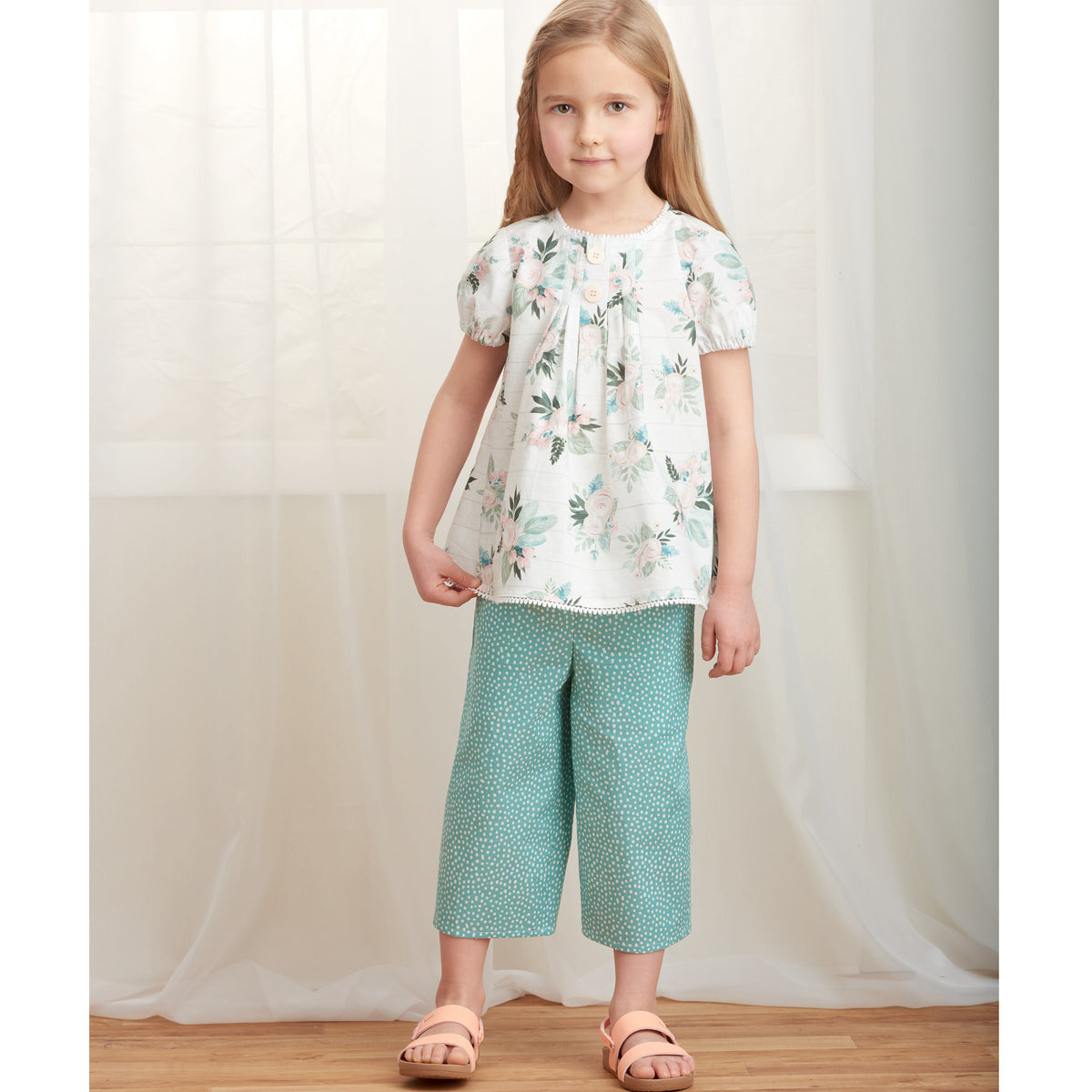 Simplicity S9321 sewing pattern envelope showing child's casual wear designs