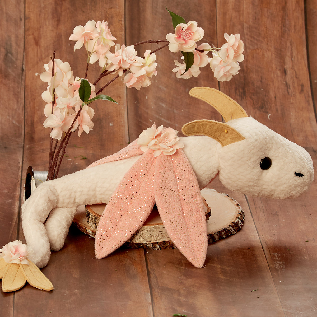 Simplicity S9363 sewing pattern envelope showing green, red and cream plush dragon soft toys