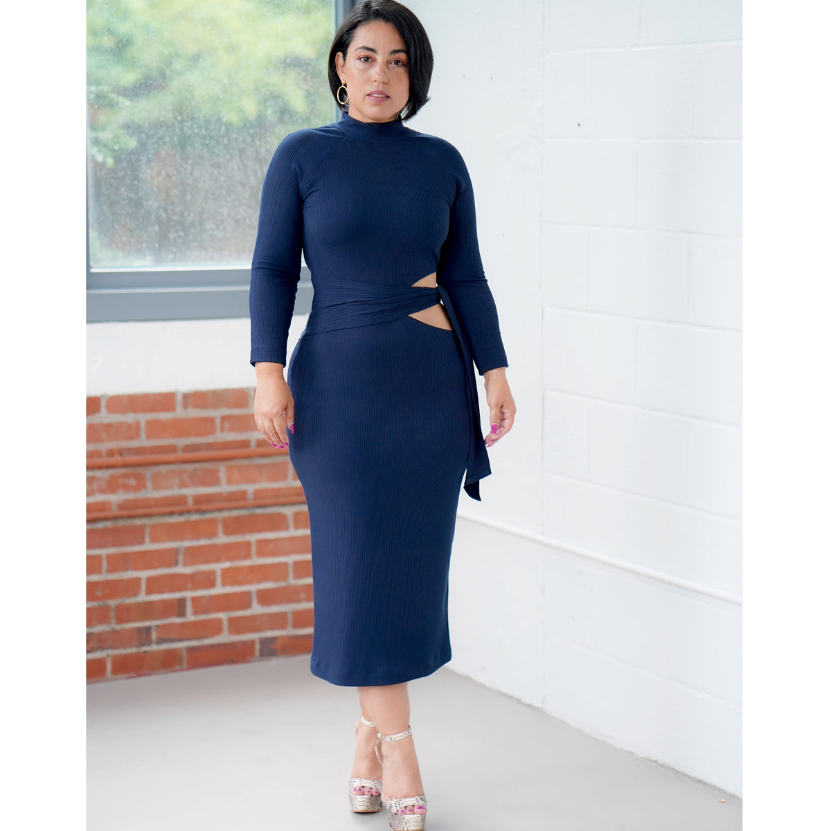 Simplicity S9370 sewing pattern envelope showing women's knit dresses with cut-out midriff