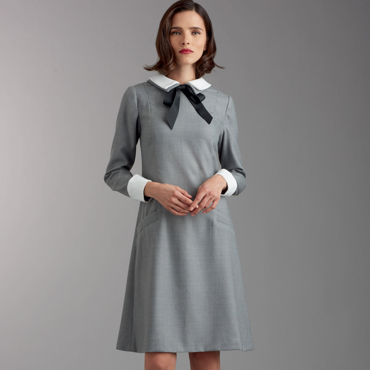 Simplicity S9371 sewing pattern envelope showing women's collared dresses with belt