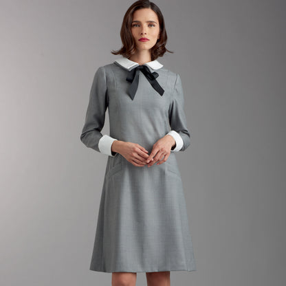 Simplicity S9371 sewing pattern envelope showing women's collared dresses with belt