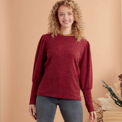 Simplicity S9385 sewing pattern envelope showing women's knit tops