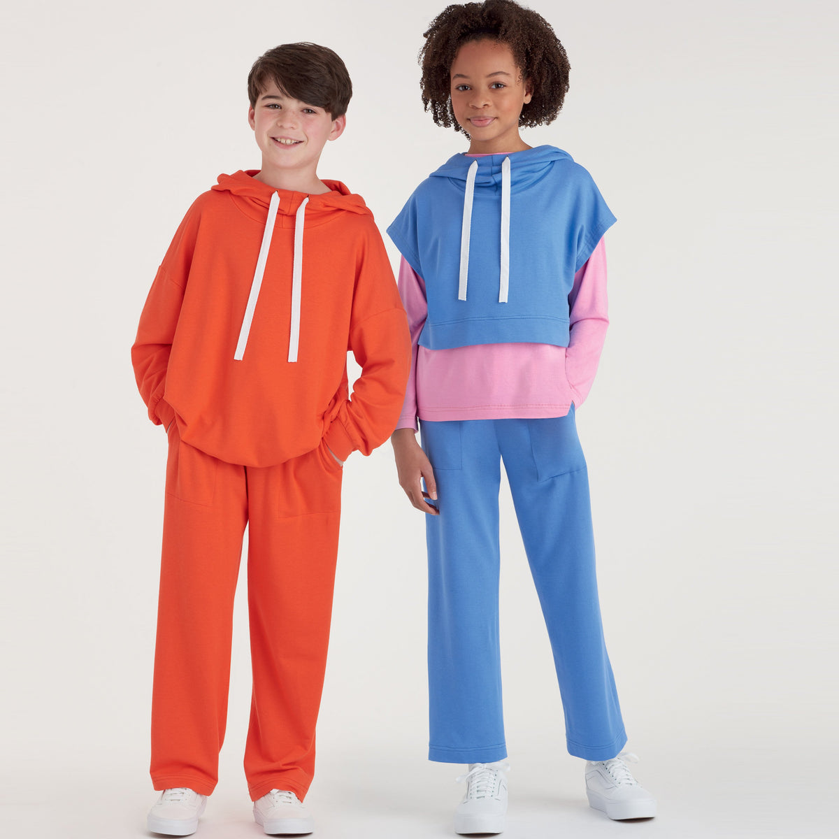 Simplicity S9394 sewing pattern envelope showing children's hoodies, trousers and T-shirts