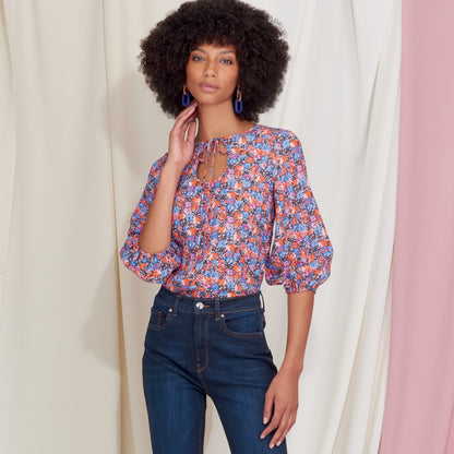 Simplicity S9469 sewing pattern envelope showing tops and vests