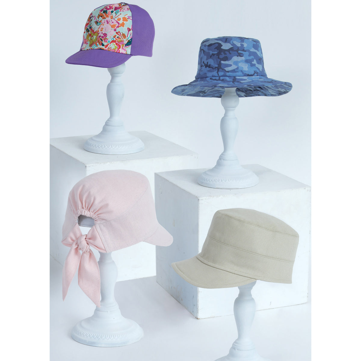 Simplicity S9509 pattern envelope showing casual hats for adults and children