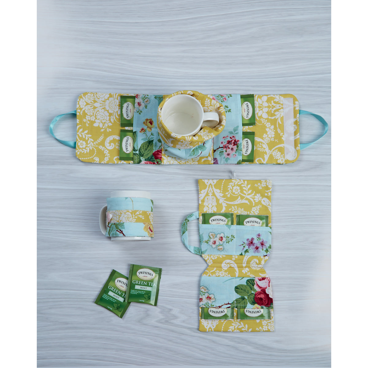 Simplicity S9511 pattern envelope showing printed fabric tea time accessories