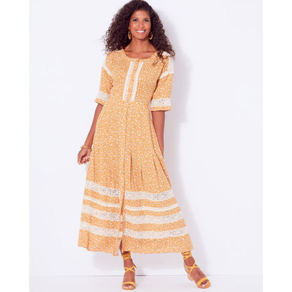 Simplicity S9542 pattern envelope showing dresses with pleated skirts