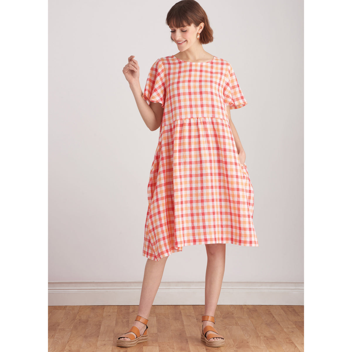 Simplicity S9596 sewing pattern envelope showing a dress