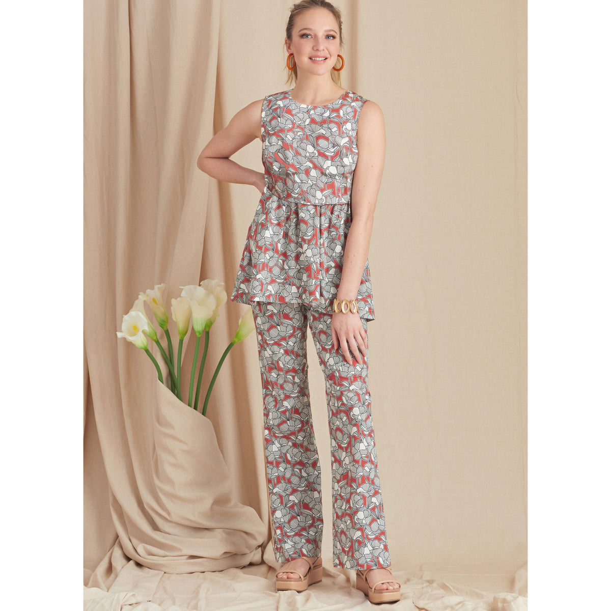 Simplicity S9611 sewing pattern envelope showing tunic and cropped top designs