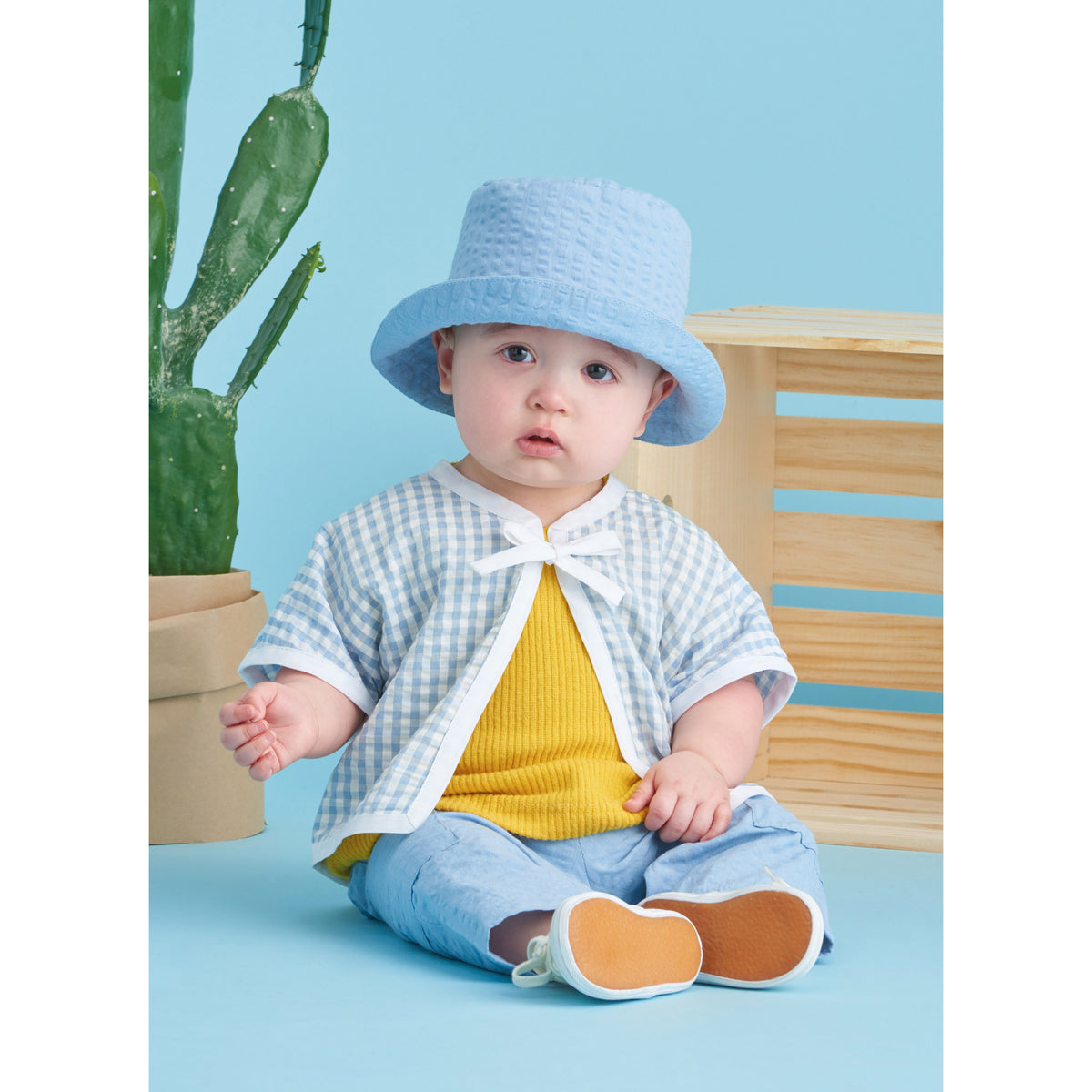 Simplicity S9616 sewing pattern envelope showing baby jacket designs