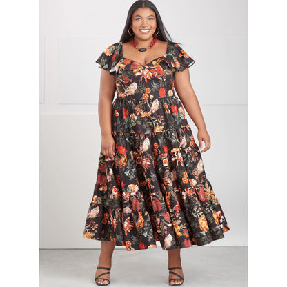 Simplicity S9704 sewing pattern envelope showing V-neck flounce dress