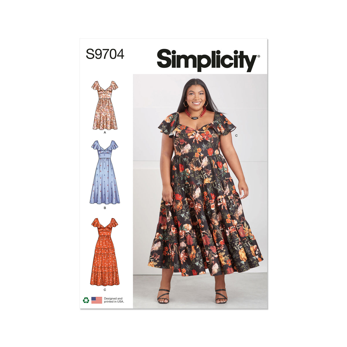 Simplicity S9704 sewing pattern envelope showing V-neck flounce dress