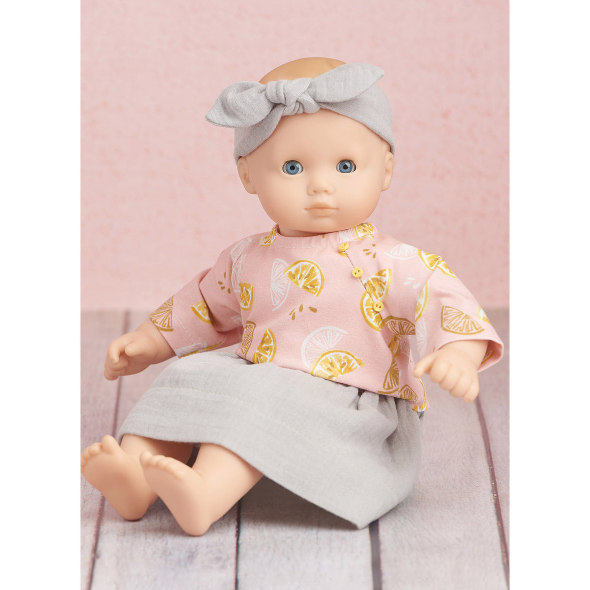 Simplicity S9727 sewing pattern envelope showing baby doll clothes
