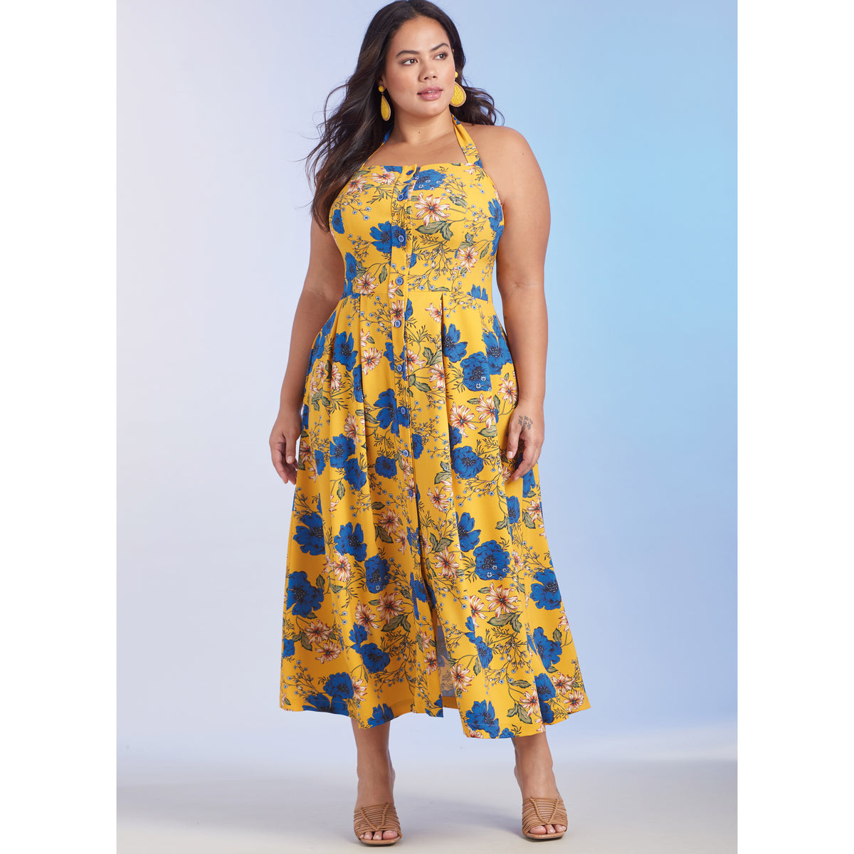 Simplicity S9743 sewing pattern envelope showing a plus size dress