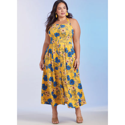 Simplicity S9743 sewing pattern envelope showing a plus size dress