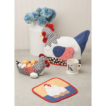Simplicity S9773 sewing pattern envelope showing a chicken tea cosy, fabric bowl and oven gloves