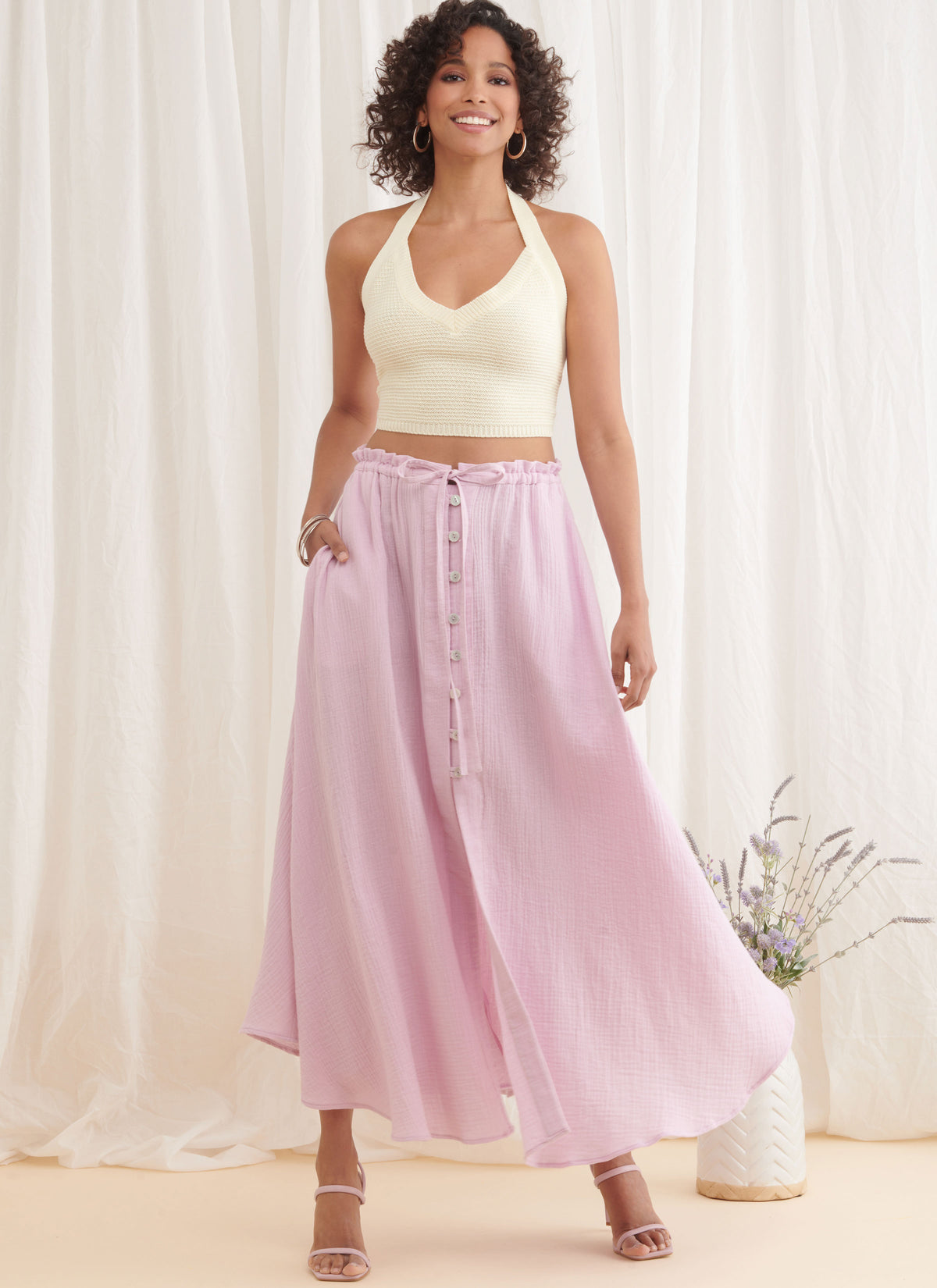 Simplicity S9786 sewing pattern envelope showing a skirt and trousers with ruffled waist